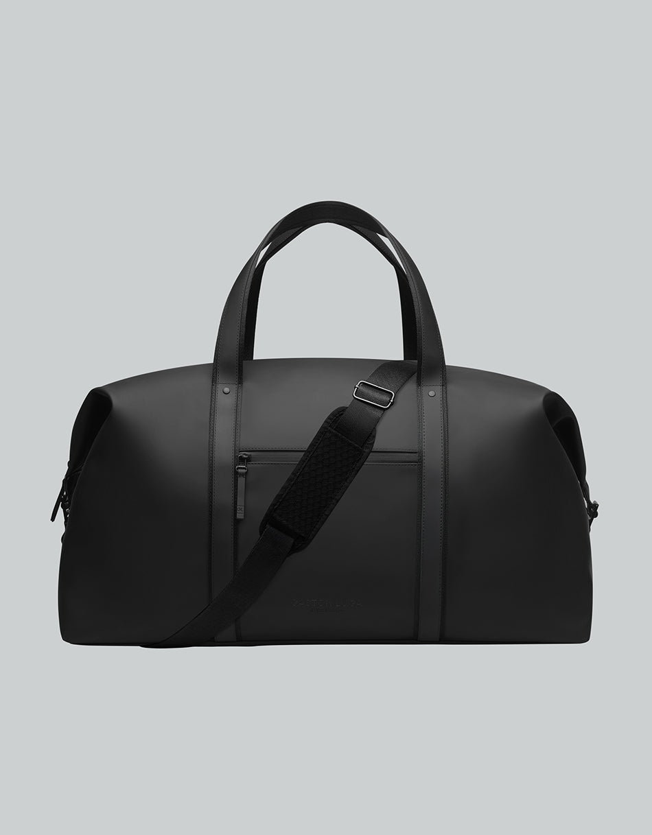 Bolso de viaje Däsh 2.0 G Negro, vista frontal con asas y correa