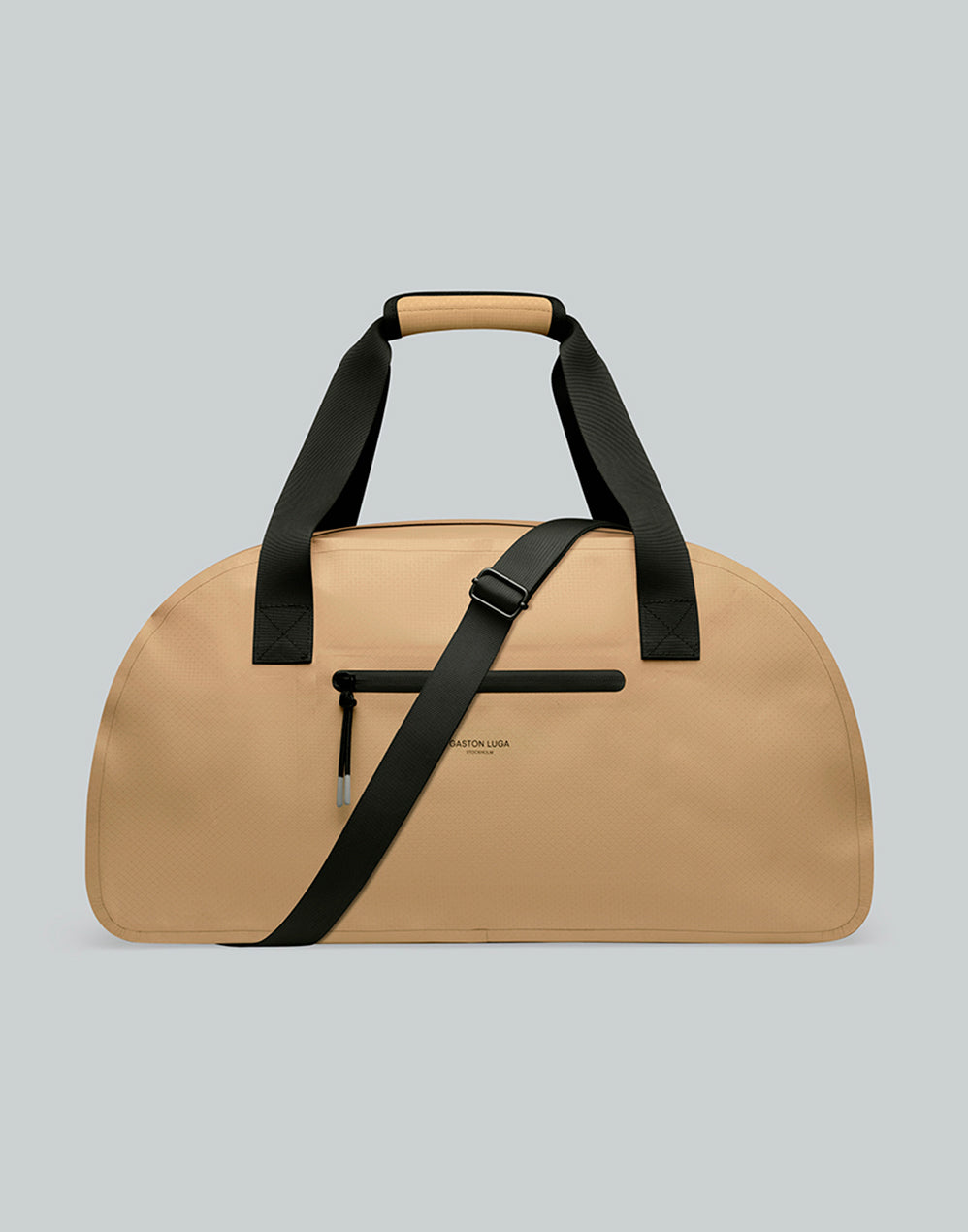 Bolso Lightweight DuoSeal Duffel Latte, vista frontal con asas y correa