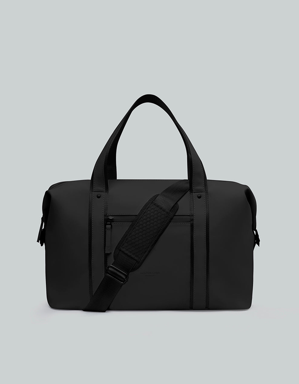 Bolso de viaje Däsh 2.0 CH Negro, vista frontal con asas y correa