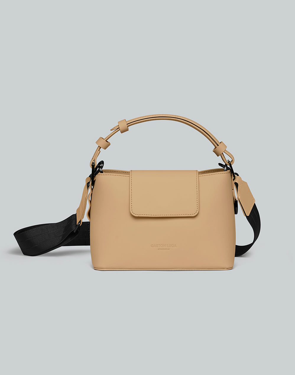 Bolso Spläshini Latte, vista frontal con asa y correa